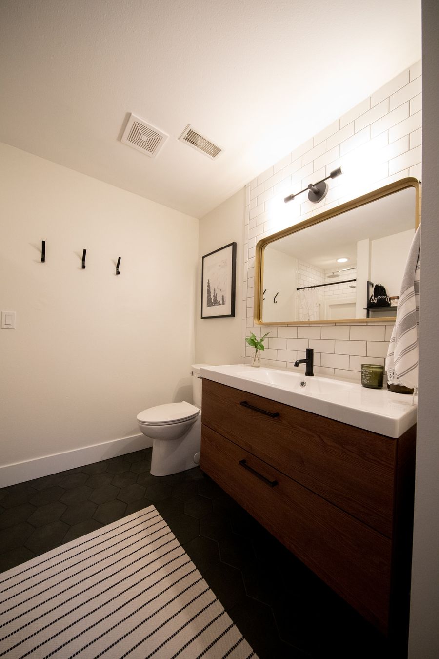 Second bathroom with a wood vanity